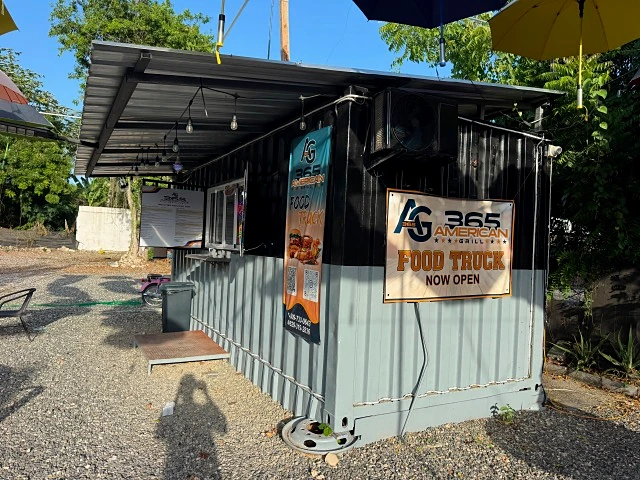 The side of the 365 American Grill food truck with the Food Truck Now Open sign