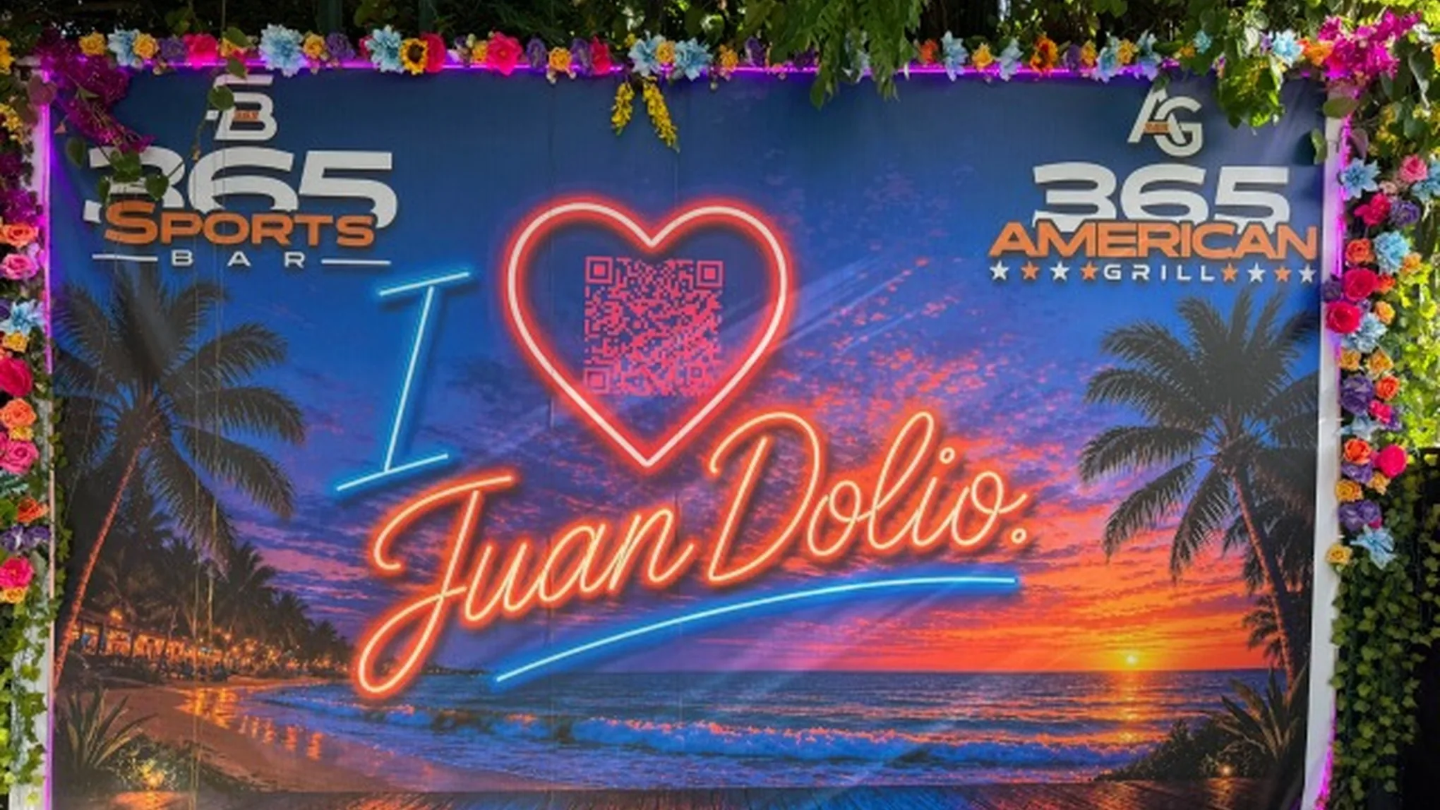 The I love Juan Dolio photo sign at 365, framed in flowers