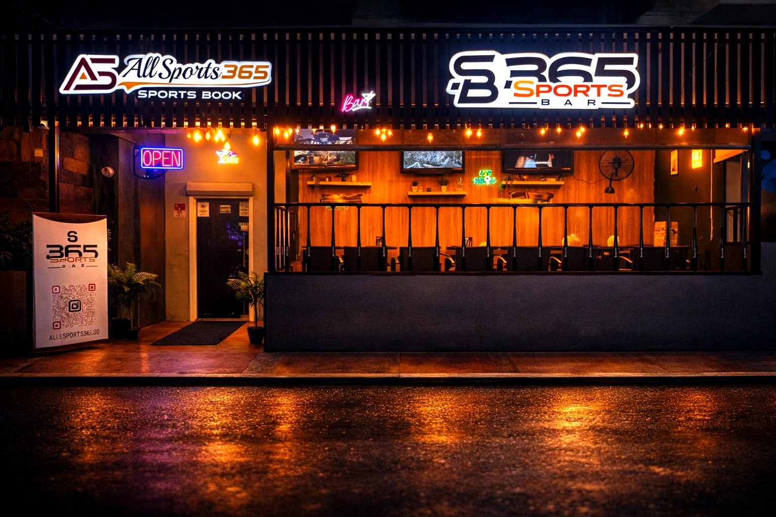 365 Sports Bar and All Sports 365 Sports Book lit up at night on Calle El Tanque, Juan Dolio